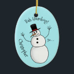 Funny rude Snowman Name und Jahr Keramik Ornament<br><div class="desc">Ein ovales Keramik-Ornament mit einem Cartoon-Kunstschneemann,  der ein würziges Verhalten hat,  darauf gedruckt. Geben Sie einen Namen und das aktuelle Jahr ein. Die Rückseite ist gleich,  sodass beide Seiten beim Aufhängen am Baum sichtbar sind.</div>