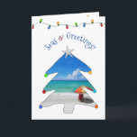 Funny Seas and Greetings Foto von Beach Christmas  Feiertagskarte<br><div class="desc">Wish them Seasons Greetings this holiday season with this funny and cute foto beach Christmas card with the greeting, "Seas & Greetings" in arched machen featuring a white sandy beach, red beach umbrella, and seascape inside of a whimsical Christmas tree! Inside of the card feature your foto and the message,...</div>