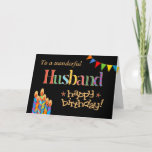 Für husband-Chic Candles, Bunting Birthday Card Karte<br><div class="desc">Eine helle und farbenfrohe Geburtstagskarte für einen Ehemann,  mit Birthday Cake Candles,  Bunting and Stars und dem Wort "Husband" in gemusterter Schrift,  in Goldeffekt (nicht in metallischer Tinte) und Happy Birthday,  auch in Goldeffekt,  auf schwarzem Hintergrund. Ein digitales Design von Judy Adamson.</div>