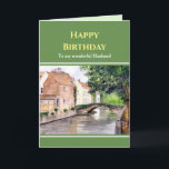 Für Husband zum Geburtstag Brügge Belgien Wasserfa Karte<br><div class="desc">Entworfen auf Aquarellmalerei einer Szene aus Brügge, mit Blick auf Häuser und eine traditionelle Brücke über den Fluss schattig durch einen Baum an der Flussseite. Brügge ist die Hauptstadt von Westflandern im Nordwesten Belgiens und zeichnet sich durch seine Kanäle, gepflasterten Straßen und mittelalterliche Architektur aus. Bitte Karo in meinem Shop...</div>