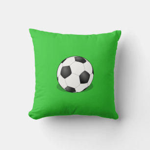 Fußball-Ball im grünen Hintergrund Kissen