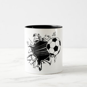 Fußball, der heraus sprengt zweifarbige tasse
