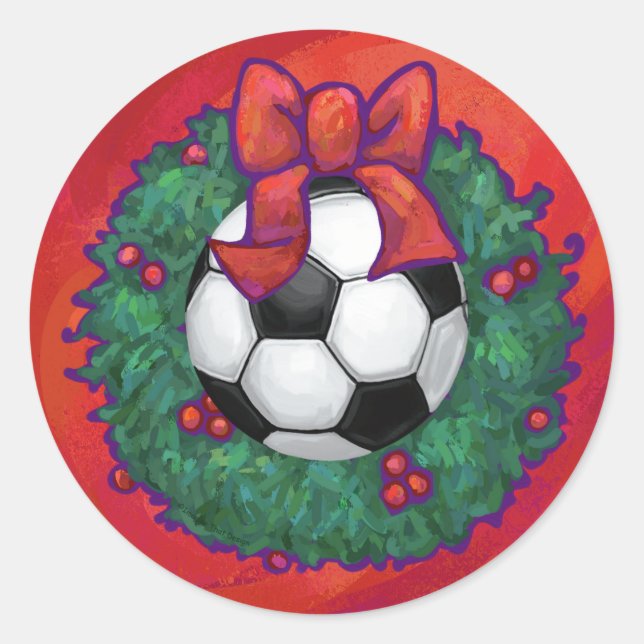 Fußball in einem Weihnachtskranz auf Rot Runder Aufkleber (Vorderseite)