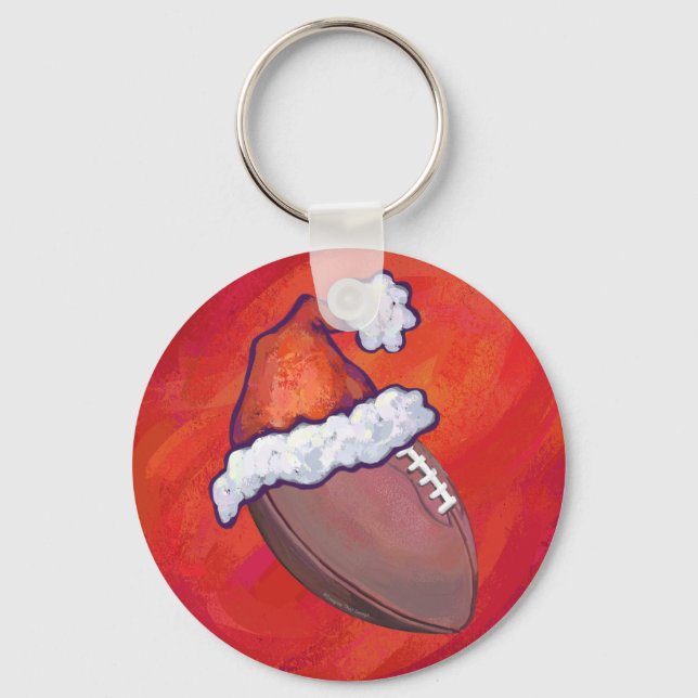 Fußball in Weihnachtsmannmütze über Rot Schlüsselanhänger (Vorderseite)