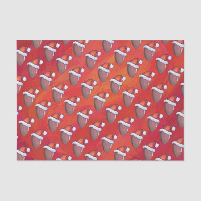 Fußball in Weihnachtsmannmütze über Rot Seidenpapier (Vorderseite)