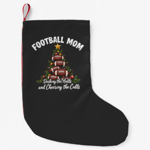 Fußball-Mama, die die Hallen zum Weihnachtsfußball Kleiner Weihnachtsstrumpf