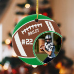 Fußball Name Jersey Nummer Foto Keepake Keramik Ornament<br><div class="desc">Dieses Design verfügt über einen Fußball-Hintergrund mit Platz für einen Namen, eine Nummer und ein Foto. Klicken Sie auf die Schaltfläche Anpassen für mehr Flexibilität beim Anpassen des Textes! Variationen dieses Designs sowie der Koordinationsprodukte sind in unserem Shop, zazzle.com/store/doodlelulu, erhältlich. Kontaktieren Sie uns, wenn Sie dieses Design für ein bestimmtes...</div>