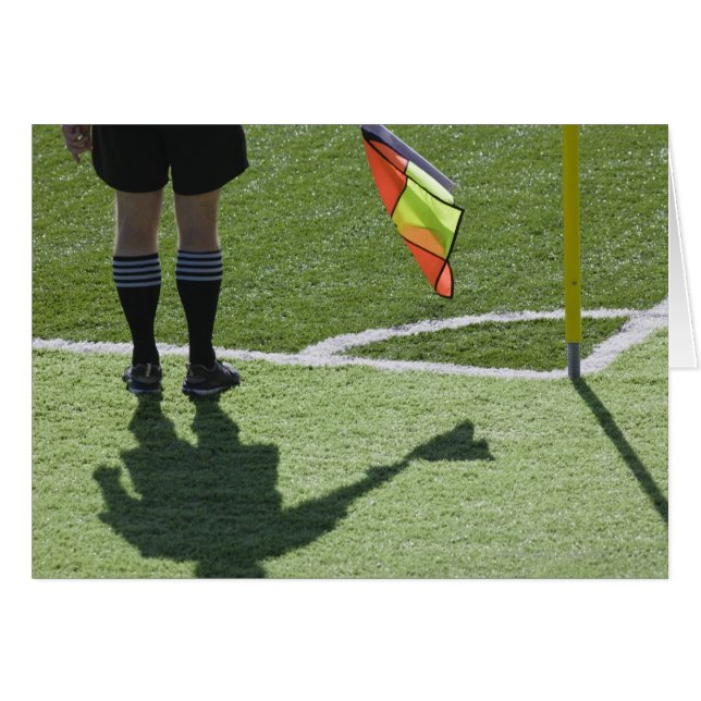 Fußball-Schiedsrichter mit Flagge. (Vorderseite (Horizontal))