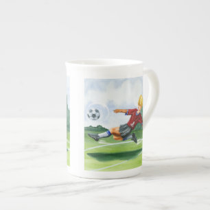 Fußball-Spieler, der einen Ball durch Jay Prozellantasse