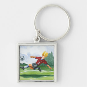 Fußball-Spieler, der einen Ball durch Jay Schlüsselanhänger