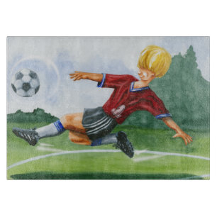 Fußball-Spieler, der einen Ball durch Jay Schneidebrett