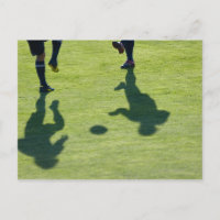 Fußball-Spieler, die Übungen machen.