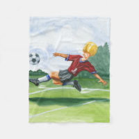Fußball-Spieler spielen einen Ball von Jay Throckm