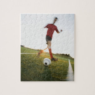 Fußball-Spieler treibende Kugel