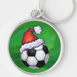 Fußball-Weihnachtsmannmütze auf Grün Schlüsselanhänger