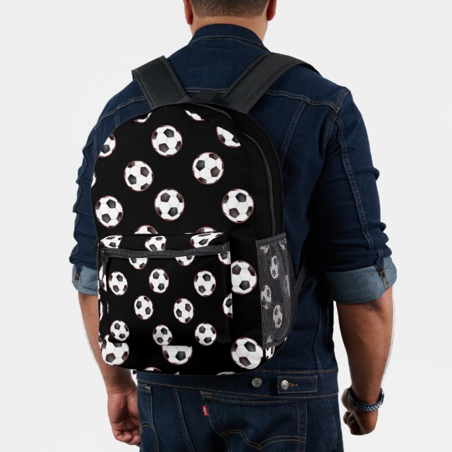 Fußbälle auf schwarz bedruckter rucksack (Insitu (Modell))