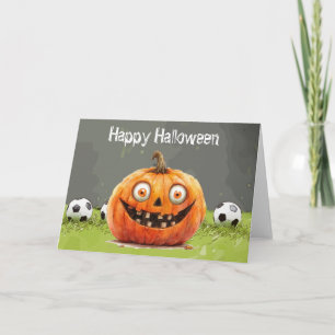 Fußballfröhliches Halloween mit Bälle auf grünem G Karte