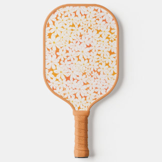 Gänseblümchen-Patch mit orangefarbenem Pickleball- Pickleball Schläger