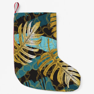 Gardinen aus Gold, tropische Blätter. Kleiner Weihnachtsstrumpf