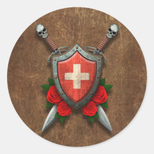 Gealtertes Schweizer Flaggen-Schild und Schwerter Runder Aufkleber