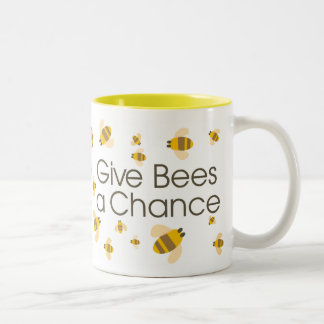 Geben Sie Bienen eine Möglichkeits-Tasse Zweifarbige Tasse