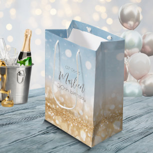 Geburtstagsblauer funkelnder goldener Name Mittlere Geschenktüte
