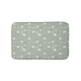 Gedämpftes Salbeigrün und weißes Wildblumenmuster Badematte