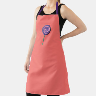 Gedrehter lila Lutscher mit rosa Schürze