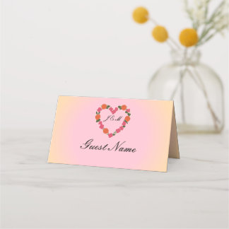 Gefaltete rosa und orangefarbene Hochzeitsplatzkar Platzkarte