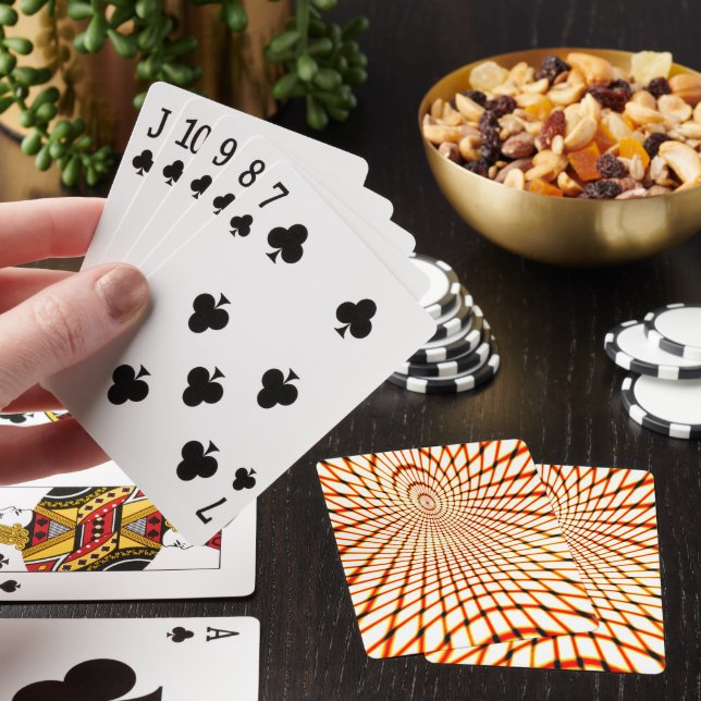 geflochtene orangefarbene Linien bilden einen gesu Spielkarten (In Situ)