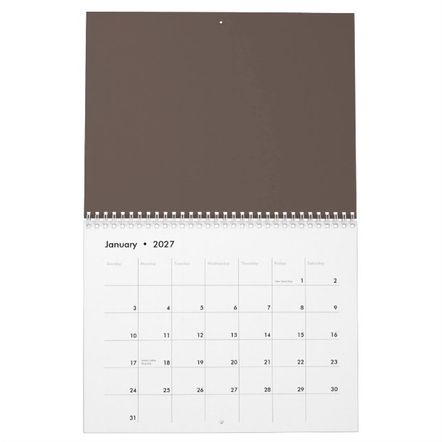 Gegen eine stilvolle braune Mauer Kalender (Jan 2027)