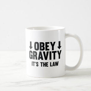 Gehorsam Schwerkraft. Es ist das Gesetz. Kaffeetasse