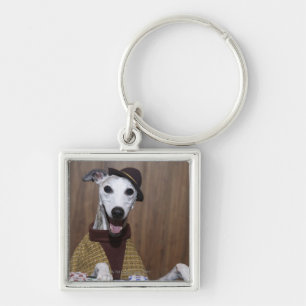Gekleideter oben Whippet Hund an spielendem Tisch Schlüsselanhänger
