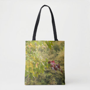 Gelb und Rot verlässt Taschen-Tasche Tasche