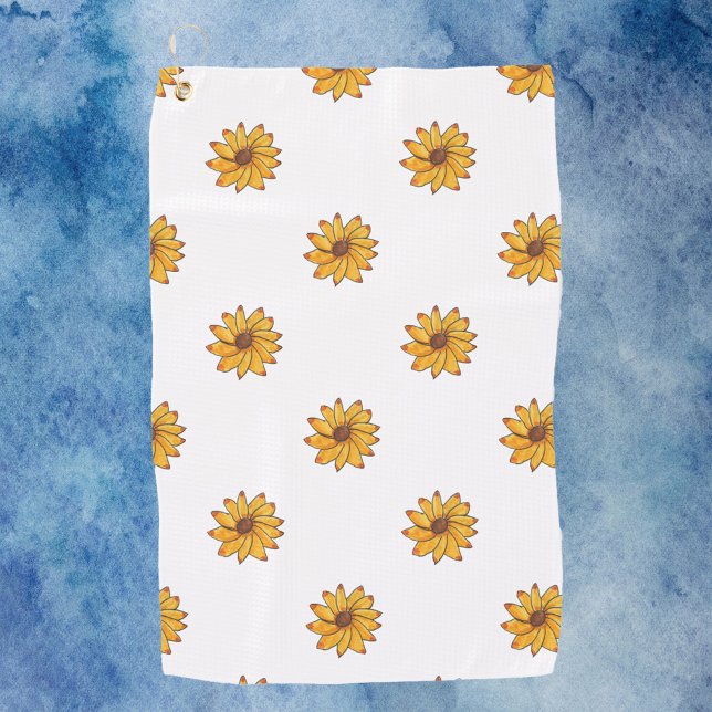Gelbblütenmuster Golfhandtuch (A golf towel with a pattern of hand drawn sunflowers.)