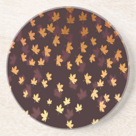 Gelbe Ahornschicht auf dunkelrot Sandstein Untersetzer