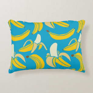 Gelbe Bananen, blaues Hintergrundmuster Dekokissen