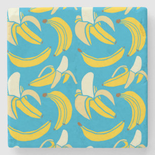 Gelbe Bananen, blaues Hintergrundmuster Steinuntersetzer