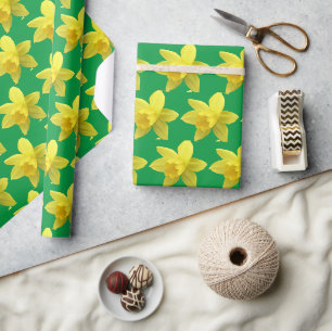 Gelbe Daffodien auf grüner Blüte Geschenkpapier
