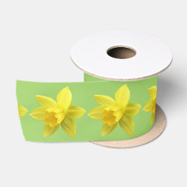 Gelbe Daffodien auf hellgrünen Satinband