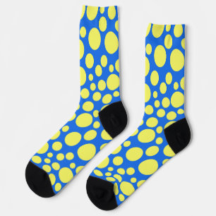 Gelbe Erbsen auf himmelblauem Hintergrund Socken
