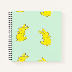 Gelbe Happy Bands auf aquamarinen Notizbuch