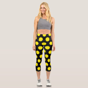 Gelbe Kreise mit schwarzem Hintergrund Capri Leggings