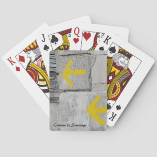 Gelbe Pfeile, die Karten spielen Spielkarten