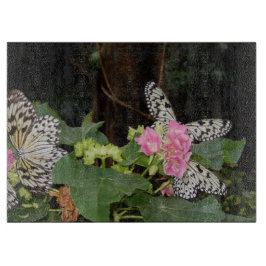 Gelbe Schmetterlinge und rosa Blume Schneidebrett