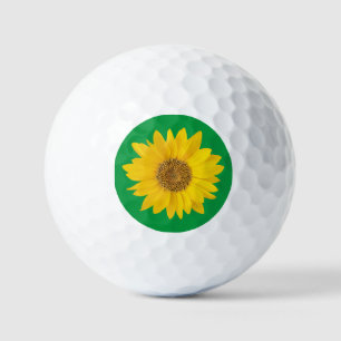 Gelbe Sonnenblume auf hellgrün Golfball