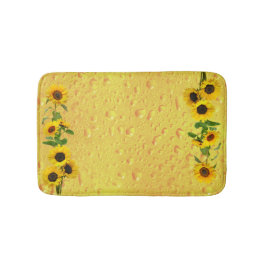 Gelbe Sonnenblumen mit Wasserregen fallen auf Glas Badematte
