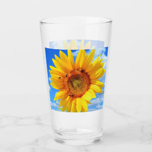 Gelbe Sonnenblumen und Bienen auf blauem Himmel -  Glas