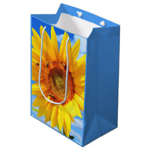 Gelbe Sonnenblumen und Bienen auf blauem Himmel -  Mittlere Geschenktüte