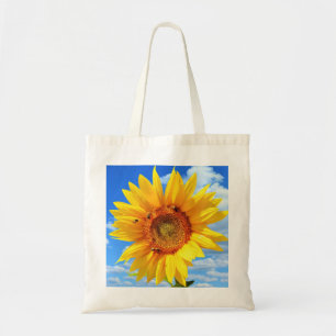 Gelbe Sonnenblumen und Bienen auf blauem Himmel - Tragetasche